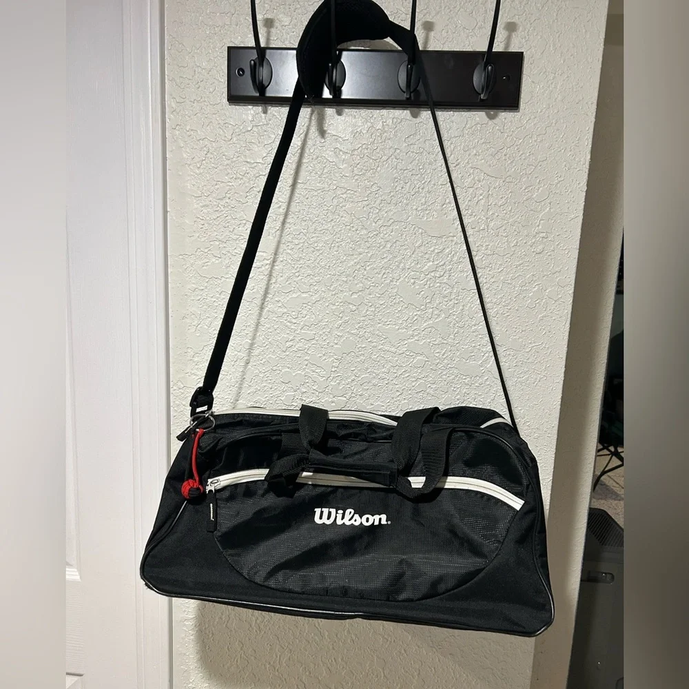 Wilson duffle bag/gym bag. Approximately 10 x 18 x 11.